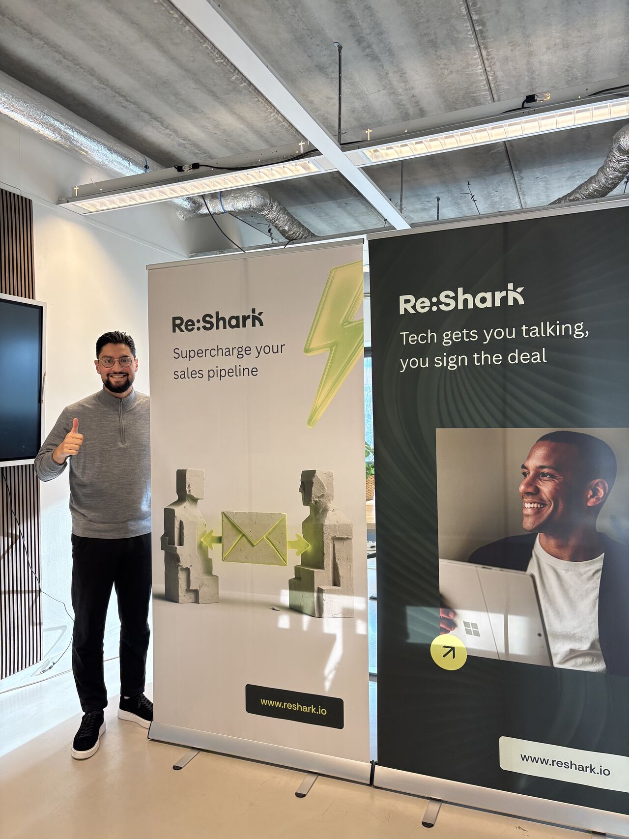 An early Re:Shark stand with the first roll-up banners